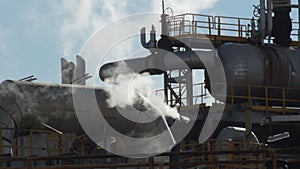 Old industrial factory expelling smoke and contamination