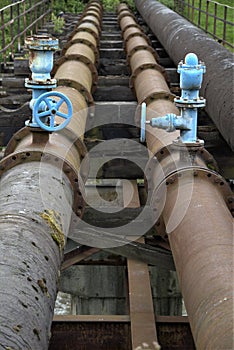Old industrial pipes and water valves