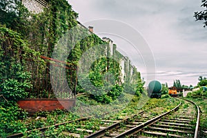 Old industrial railroad station platform, post apocalypse urbex concept