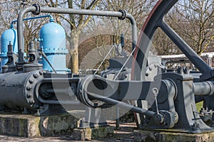 Old industrial sewing machine, water turbine