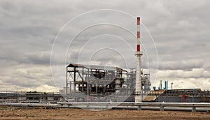 Old installation of a refinery smokestack under