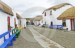 Old Irish Thatch Cottage in a village in Ireland