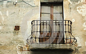 Old iron balcony in an abandoned house