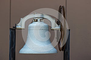 Old Iron Bell With Rusty Wheel