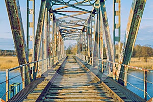 Old iron bridge. Broken construction and nature view, river. Travel photo 2019