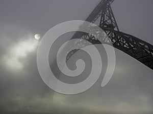 Old iron bridge in the fog