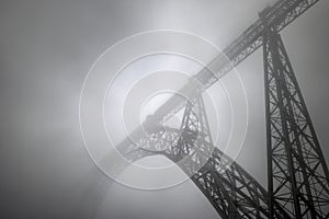 Old iron bridge in the fog