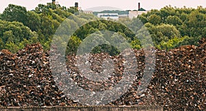 Old Iron Dump In Back Yard Of Factory. Eco Concept Garbage Disaster From Ecological Pollution Of Environment. Waste