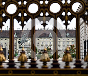 Old iron fence and statue of Archduke Karl on Heldenplatz