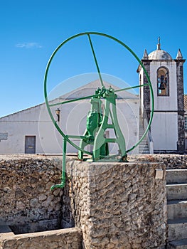 Antique Hand Operated Water Pump, Cacela Velha, Eastern Algarve, Portugal. photo