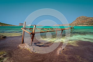 Old iron jetty on Balos beach, Crete, Greece.