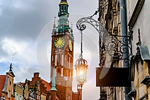 Old iron lantern on the background of the town's main town hall Gdansk Poland