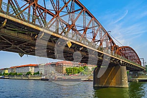 Old iron railway bridge over the Vltava river. Prague,Czech Republic