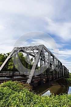 Old iron railway construction bridge in Lamphun Thailand