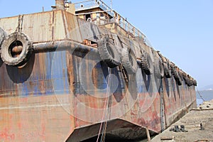 Old Iron Rusted Barge in dry dock for repairs