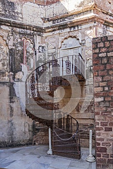 A old iron spiral staircase of the Mehrangarh Fort in Jodhpur, Rajasthan