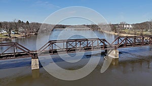 Old iron train trestle crossing the Rock River