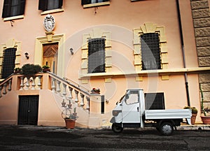 Old Italian car parked in a historic building