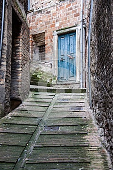 Old Italian front door in Urbino town, Italy