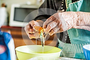 Old italian lady's hands making home made italian pasta