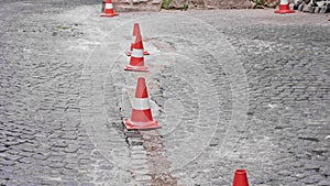 Old Italian Medieval Town Cobblestone Pavement Renovation Site Marked with Road Cones