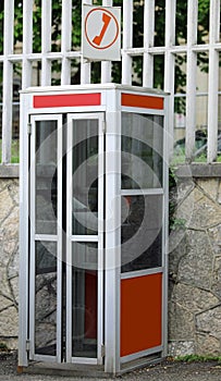 old italian phone booth called CABINA TELEFONICA photo