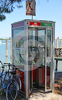 Old Italian phone booth out of order