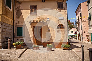 Old Italian picturesque houses. Historic center of the ancient village of Marina di Campo on the Island of Elba in Italy in the