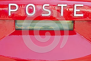 Old italian public red metal mailbox with italian Poste text photo