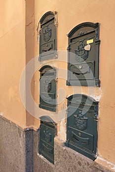 Old italian walled in letterboxes photo