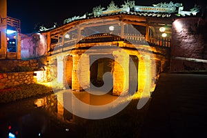 Old japanese bridge at night in Hoi An