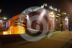 Old japanese bridge at night in Hoi An