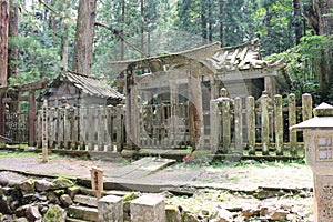 Old japanese crypt behind a traditional gate