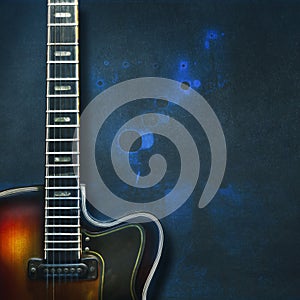 Old, jazz electric guitar on grunge blue background. Close-up. Copy space. Background for music festivals, concerts. Musical