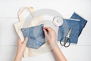 Old jeans upcycling idea. Crafting with denim, recycling old clothers, hobby, diy activity