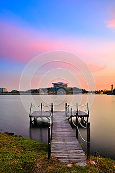 Old jetty and modern buildings