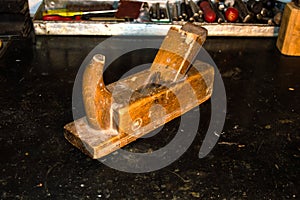 Old jointer on the table with tools