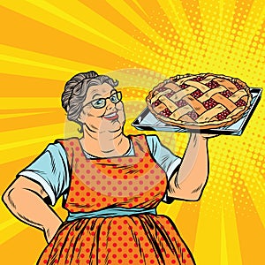 Old joyful retro woman with berry pie