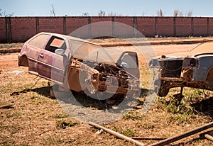 Old Junk Cars left on the side of the Road to deteriorate