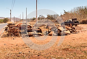 Old Junk Cars left on the side of the Road to deteriorate