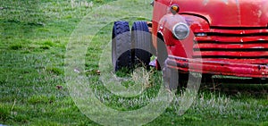 Old Junked Red Work Truck Abandoned in Green Field