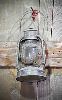 An Old Kerosene Lamp Hanging on a Red Hook