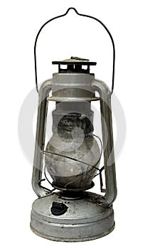 Old kerosene lamp isolated on white background .