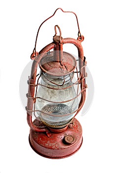 Old kerosene lamp isolated on white background