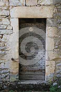 Old keyhole lock and doorknocker, Dordogne, France