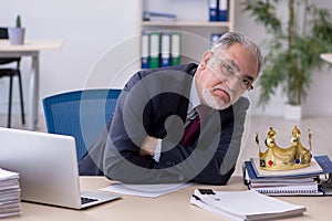 Old king businessman employee at workplace