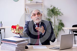 Old king businessman employee at workplace