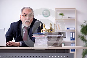 Old king businessman employee at workplace