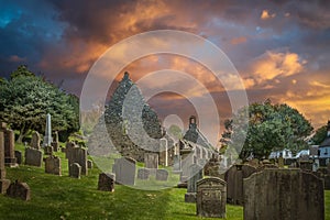 The Old Kirk Ruins at Kirkoswald against a red Stormy Sky