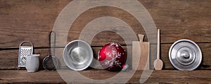 Old kitchen miniatures on wooden background for christmas decora